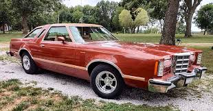 Image result for Bright Lime Starfire 1975 Thunderbird