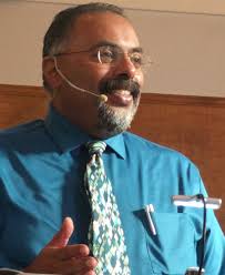 Abraham Chacko speaks during the Bible Hour.