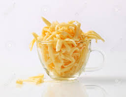 Download Grated Yellow Cheese In A Glass Cup Stock Photo Picture And Royalty Free Image Image 21624414 PSD Mockup Templates