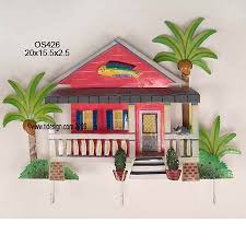 Metal yellow roof caribbean beach hut wall art. Silly Themed Shacks Hurricane Rita