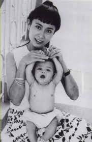 Suu kyi is not consistent with what she was saying; Aung San Suu Kyi With Her Son Alexander