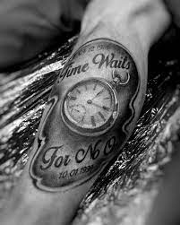 Pictured is a tattoo of a bear in black and grey, it is placed on the shoulder and is roaring, part of the face is made up of geometric shapes. 40 Time Waits For No Man Tattoo Designs For Men Quote Ink Ideas
