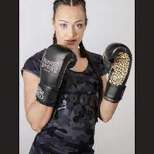 We stock everything from the best leather pro boxing gloves we sell men's, women's, and children's training gloves weighted from 8 oz. Lady Black Leo Boxing Gloves For Women Paffen Sport