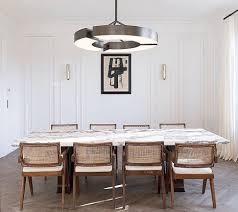Craftsman style pendant lighting over dining room table open plan contemporary kitchen with island gray qaurtz countertops and rustic wood dining table 12 Creative And Functional Ideas For Dining Room Lighting Certified Lighting Com