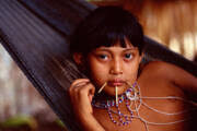 Yanomami Girl Relaxes In A Hammock Portable Battery Charger by Robert Caputo 