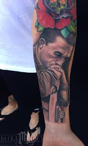 His johnny cash tattoo looks like a pig mated with wayne newton and that's what was put on his arm. Johnny Cash Tattoo By Mike Devries Tattoos