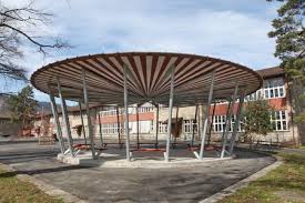 Pavillon Fur Pausenplatz Schulhaus Entlisberg In Zurich Stahlbau Mit Kupferblech Dach Und Zweifarbiger Holz Untersicht Guigna Pavillon Stahlbau Architektur