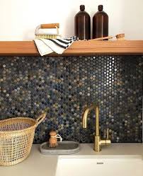 The penny tiles and the sink work perfectly to infuse an elegant look only with a simple touch. 25 Penny Tile Backsplashes To Add Interest To Your Kitchen Shelterness