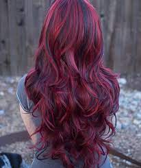Rockstar chic in red and black. Lucy Fiery Red Long Wavy Wig With Lowlights Synthetic Hair Hair Styles Dyed Red Hair Deep Red Hair