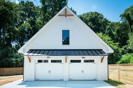 Here is a garage exterior design in brick and wood. Detached Garage Farmhouse Garage Charlotte By Pike Properties Houzz