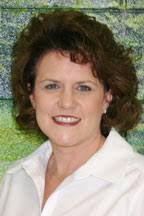 School board names Cooper to vacancy, honors Mark Brooks