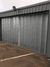 Gates up to 24' wide are always in stock. Steel Sliding Folding Doors For Industrial Commercial Premises Uk