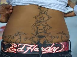 Music tattoos design with hawaiian flower tattoo for women on shoulder. 82 Stirring Music Tattoos On Back