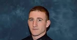 Officer identified in shooting of armed robbery suspect