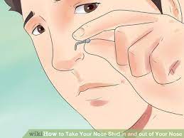 4 Ways To Take Your Nose Stud In And Out Of Your Nose Nose Piercing Stud Nose Stud Nose Piercing Jewelry