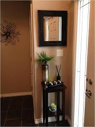 For instance, we can make use beautiful linen with sweet patterns to beautify the bench. Hugedomains Com Front Entryway Decor Entryway Decor Small Entryway Decor