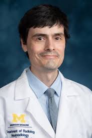 John D. Comer, MD, PhD