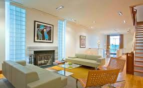 We are updating kitchen and want to cut top 3levels off the glass block wall that separates kitchen from living area. 19 Modern Spaces Featuring Glass Block