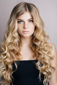 Side swept wavy long hair: Long Curly Hair 45 Trending Styles All Things Hair Us