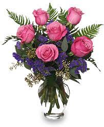 Pure white floral of roses, lilies, carnations and greens. Flowers To Go West Palm Beach Flower Vase Arrangements Flowers Roses Bouquet Floral
