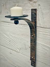 Maybe you would like to learn more about one of these? Wrought Iron Candle Wall Sconce Iron Wall Candle Holder Etsy In 2021 Iron Wall Candle Holders Wrought Iron Candle Wrought Iron Candle Wall Sconces