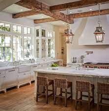 Even without the usual upper cabinets, it's clear to me that there is no lack of storage in this kitchen. Friday Favorites The Charm Of French Farmhouse Kitchens