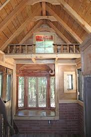 The 1904 Tiny House By Molecule Tiny Homes Features A Big Bay Window In The Living Area And A S Little Houses On Wheels Small Tiny House Tiny House Nation
