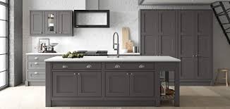 This kitchen exemplifies the perfect blend of grey and white cabinets with chic gold hardware and a bright patterned floor runner. Diamond Grey Mereway Kitchens