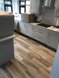 Beautiful Luxury Vinyl Tile Flooring In A Kitchen Diner Pictured Karndean Knight Tile Colour L Luxury Vinyl Tile Luxury Vinyl Tile Flooring Luxury Kitchens