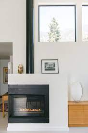 The chimney flue is the open shaft that runs from the firebox up through the chimney, creating the with a portion of the old liner now exposed, clean off the very top of it with a wire brush, clearing it of. Exposed Flue At Corner Fireplace Eclectic Living Room Los Angeles By Moss Yaw Design Studio Houzz Au