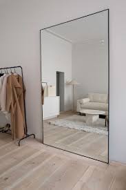 Full Length Mirror In Minimalist Living Room Decor Arrangement Ideas Arrangement Decor Minimalist Living Room Decor Minimalist Living Room House Interior