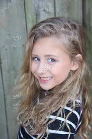 It usually is because of the contrast of both the light blonde hair and the bright blue eyes that bring the entire look alive. Blue Eyed Blonde Girl Posing For The Camera Stock Photo 2d8669d1 B0ac 4d83 Be42 A3c1a36a677c