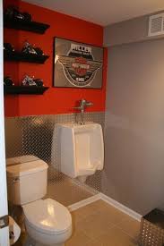 It is a room for personal hygiene, generally containing a bathtub or a shower, and possibly also a bidet. Simple And Creative Tricks Can Change Your Life Harley Davidson Touring Ape Hangers Harley Davidson Signs Ide Man Cave Bathroom Man Cave Decor Garage Bathroom
