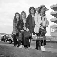 The Four Members Of The Rock Band Queen Arrive Back From Their Tour Queen Photos Queen Freddie Mercury Freddie Mercury