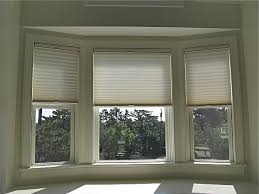 Your bay window looks so pretty with a combination of leaf green draperies and golden tying rings. Garden Trellis Screening Garden Fence Panels Gates Bow Window Treatments Ideas