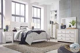 Charming whitewashed finish sets a foundation for a room bursting with personality. Paxberry Whitewash Panel Bedroom Set From Ashley Coleman Furniture