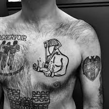 A half chest tattoo in black and gray which is big enough to be instantly understood. Top 43 Small Chest Tattoos Ideas 2021 Inspiration Guide