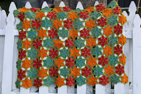Stacked woolen blankets in the mudroom at fforest: Handmade Flowers Crochet Afghan Vintage Wool Throw Blanket Orange Red Aqua W Green