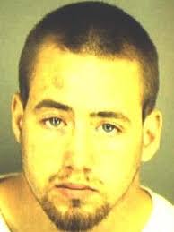 Owner charged with knifing puppy