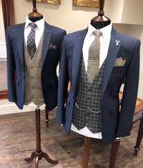 View our full collection of groom and groomsmen suits. Groom Groomsmen Look Navy Jacket Brown Tweed Waistcoat Country Wedding Inspiration Menweddin Wedding Suit Rental Wedding Suit Hire Wedding Suits Groom