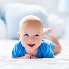 Find new bedding for your kids room and new storage to hide away all their toys. Adorable Baby Boy In White Sunny Bedroom Newborn Child Relaxing Stock Photo Picture And Royalty Free Image Image 49114763