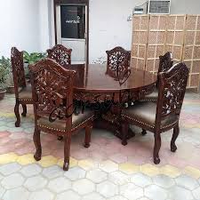 Round and oval dining tables make conversing with dinner guests easier and prevent the dreaded corner bump as you walk past. Leather Wooden Dining Set Solid Quality Wood Yt 139