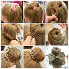 Chignon De Ballerine Decore Avec Un Nœud Hair Styles 2018 Laengere Har Gymnastik Bornefrisurer