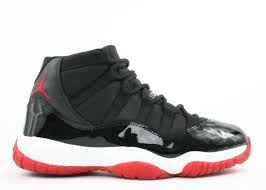 The sole of the shoe is varsity red and it has a black inner lining. Air Jordan 11 Retro Bred 2001 Air Jordan 136046 061 Black Varsity Red White Flight Club