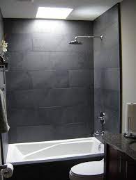 Because it's made for indoor commercial and residential use, the tile is perfect for kitchen and bathroom walls and. Bathroom With Black Tile Wall Novocom Top