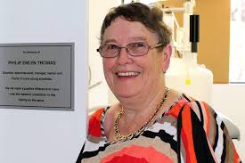 Donating with warm hand, heart and hugs