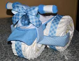 Como Fazer Bolo De Fraldas De Triciclo Almanaque Dos Pais Tricycle Diaper Cakes Baby Shower Diapers Diaper Cakes Tutorial