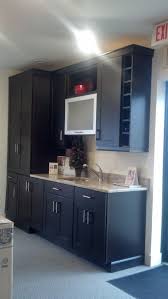 An older couple hung multiple dvd cabinets in the dining room for extra storage that is in reach. 9 Feet Of Diamond Cherry Cabinets With Granite Counter Top Sink And Faucet Modern White Kitchen Cabinets Upper Kitchen Cabinets Modern Kitchen Cabinet Design