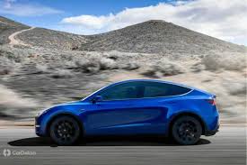 Tesla has registered its indian arm amid indications that the company is set to enter the country's automobile market. Tesla Model Y Electric Suv Revealed Will It Come To India