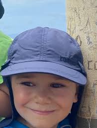 Lost blue child's cap at wetlands today